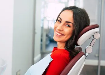 Woman smiling at Grand Rapids MI dentists