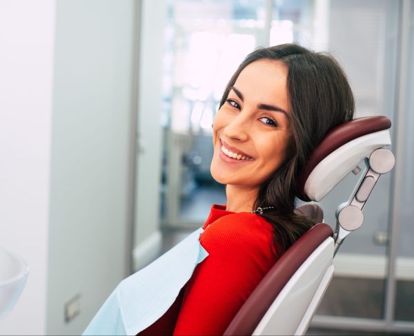 Woman smiling at Grand Rapids MI dentists